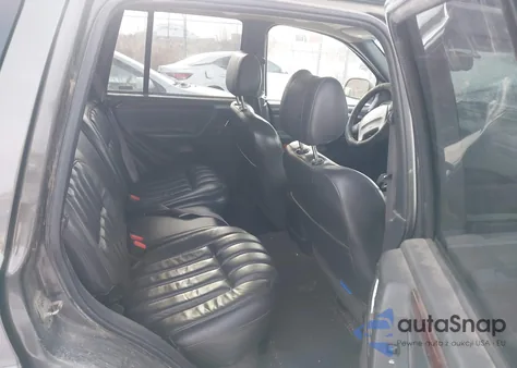 2000 Jeep Grand Cherokee Limited из США, поврежденный, VIN 1J4GW58N7YC163940